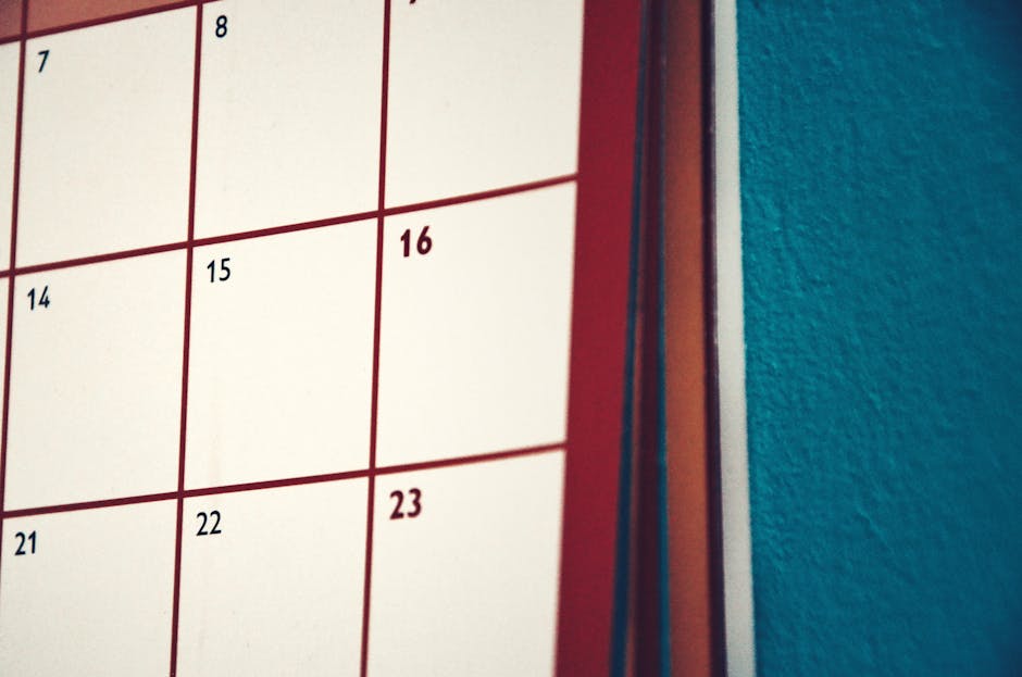 A minimalist calendar hanging on a colorful wall, perfect for planning and organization.